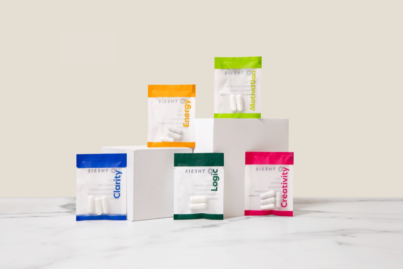 A supplement line: capsule packets in five bright colors